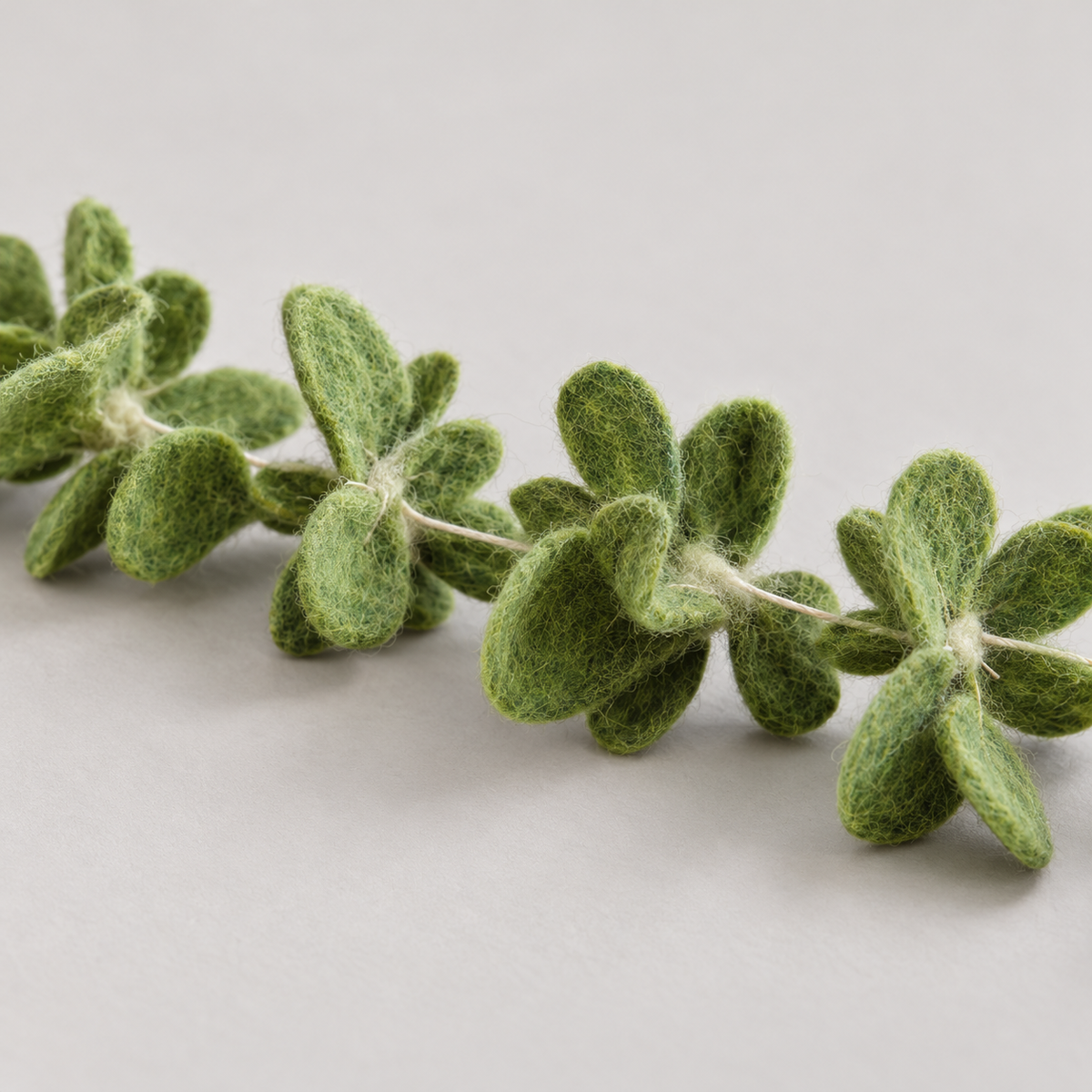 Side detail of felt leaf texture and construction