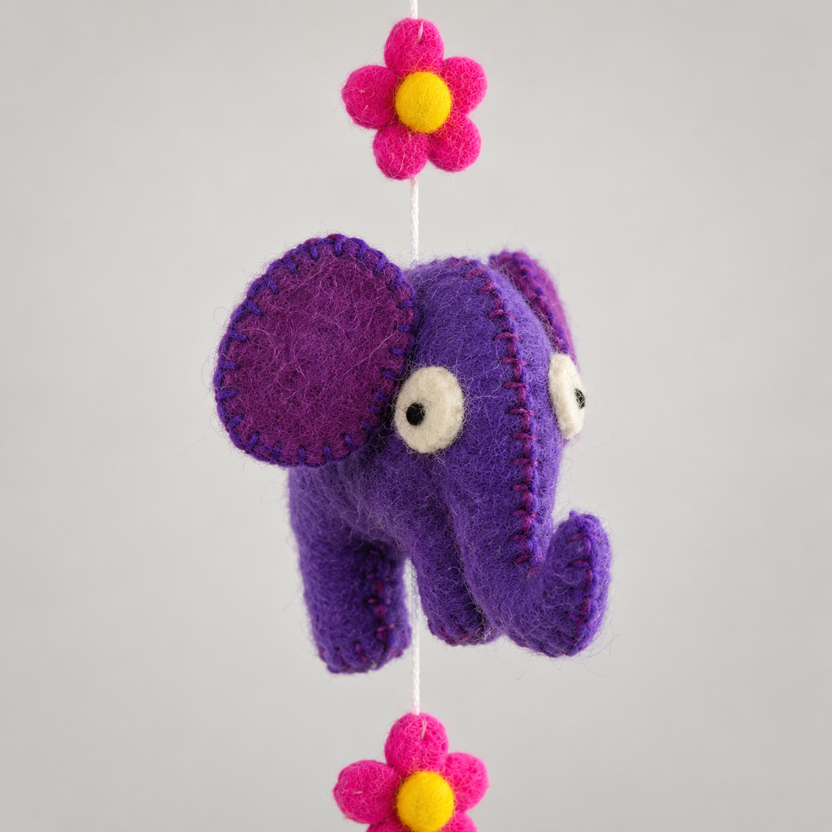 Purple felt elephant stitching and wool texture detail