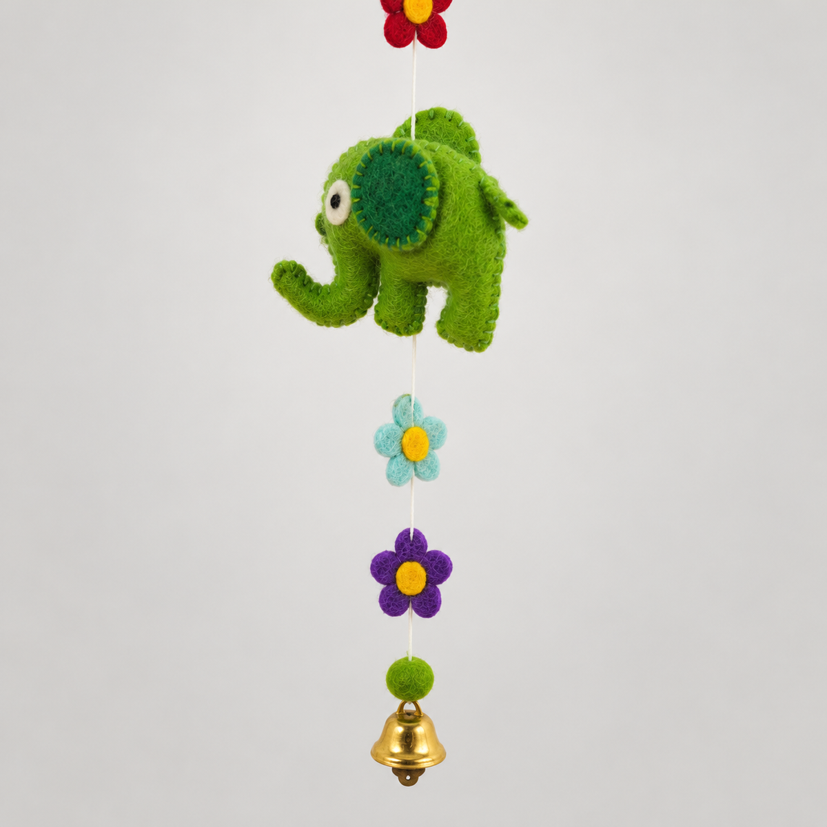 Green wool elephant, flowers and bell detail