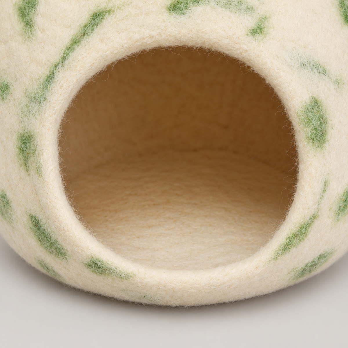 CC102 cream felt entrance and hollow interior.