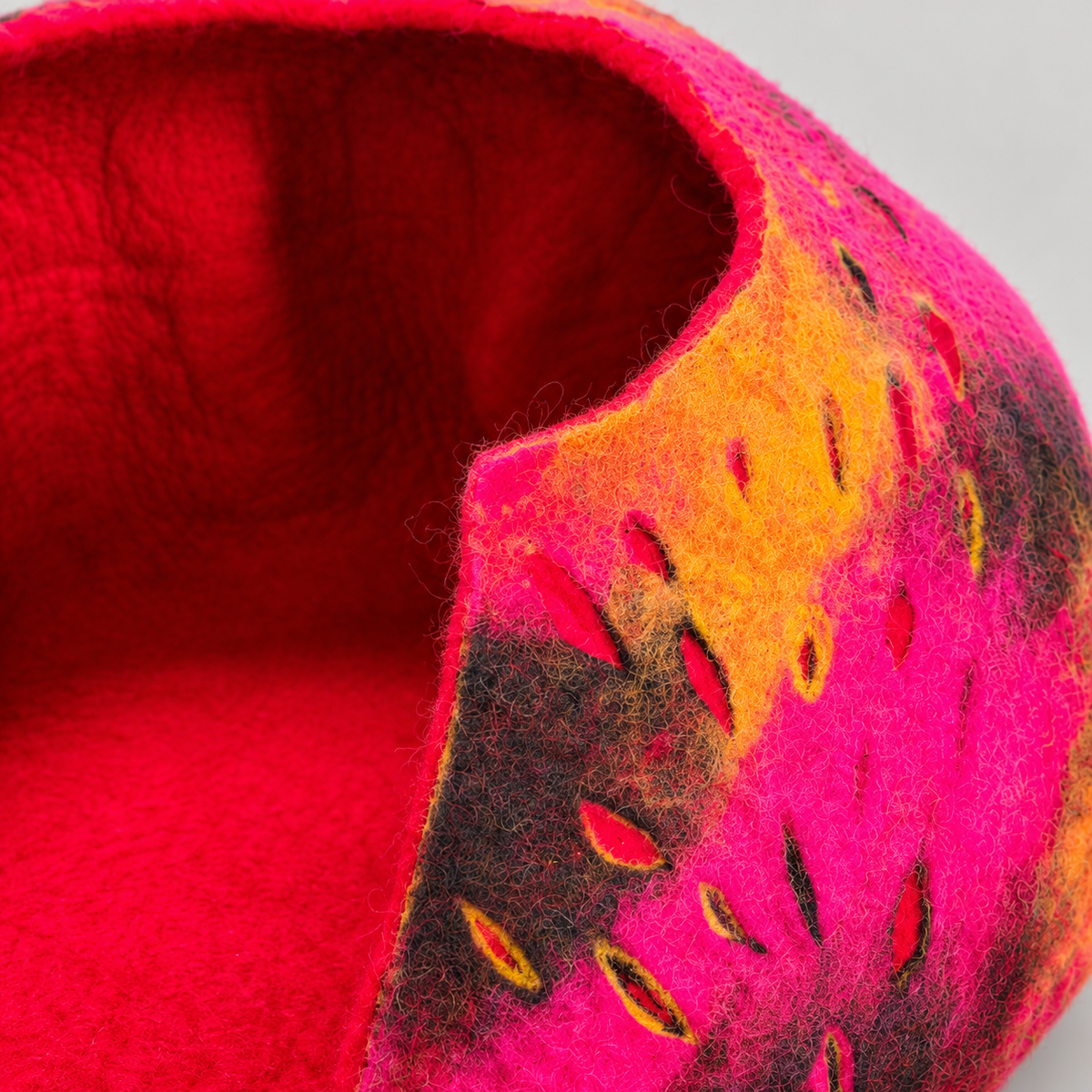 Right opening edge with pink orange and charcoal wool pattern