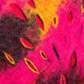 Macro detail of pink orange and charcoal felt wool texture