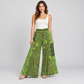 Model styling view of green floral cotton wide-leg pants
