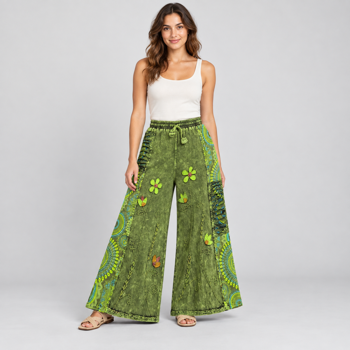 Model styling view of green floral cotton wide-leg pants