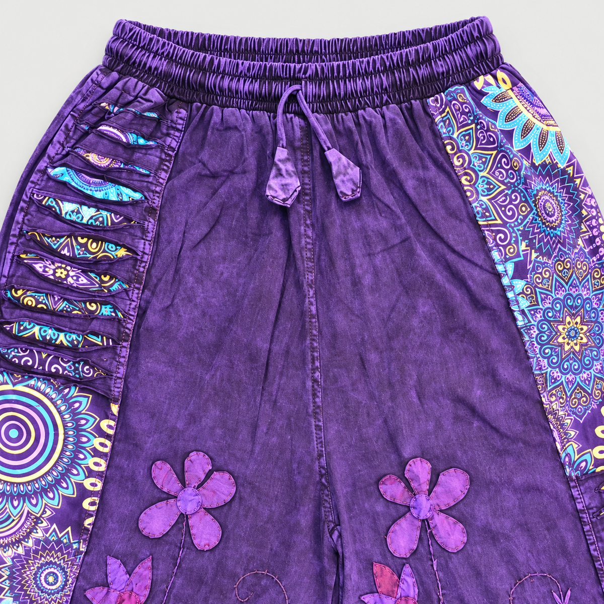 Purple elastic waistband and drawstring detail