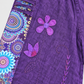 Purple flower applique and embroidered vine detail