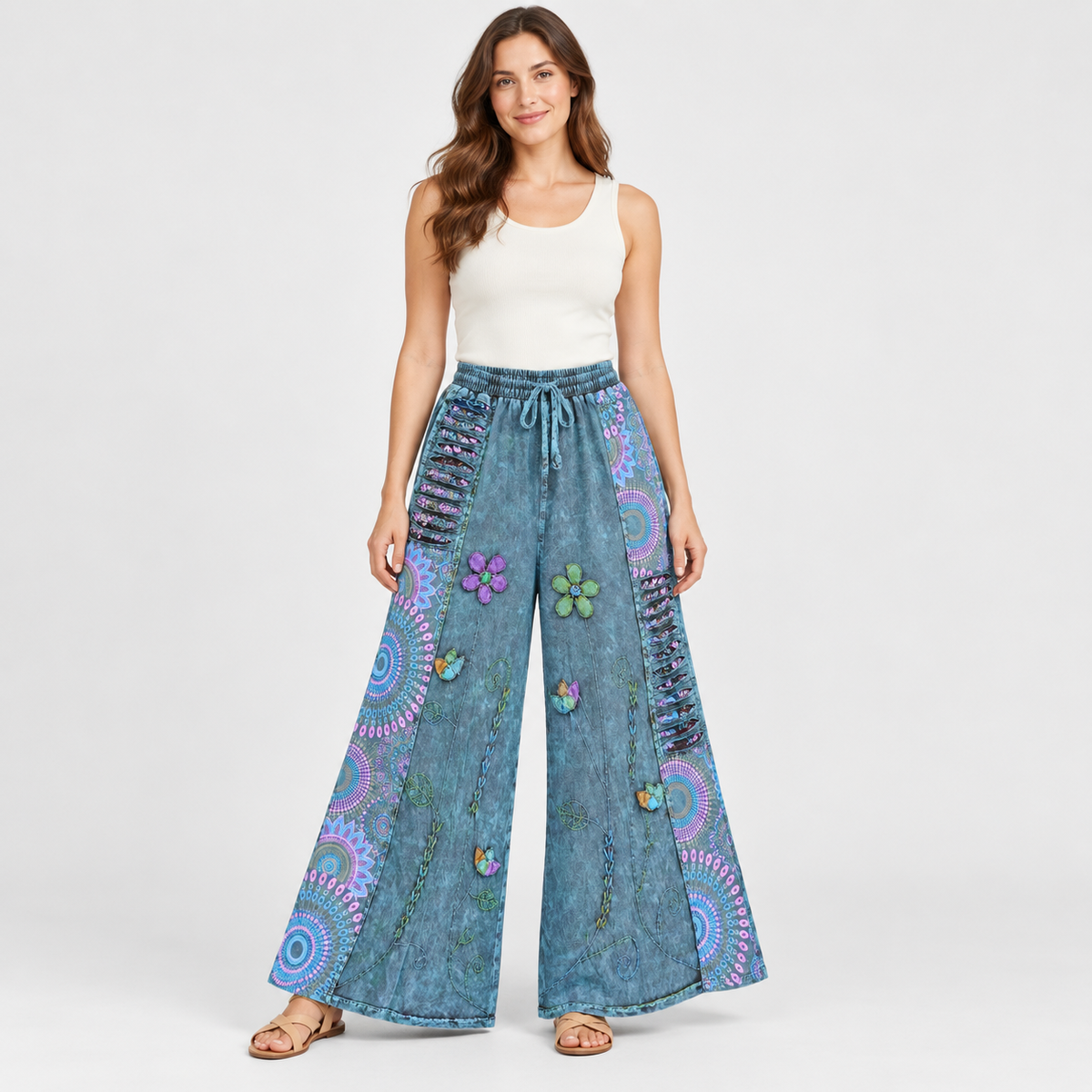 Model wearing washed blue floral cotton wide-leg pants