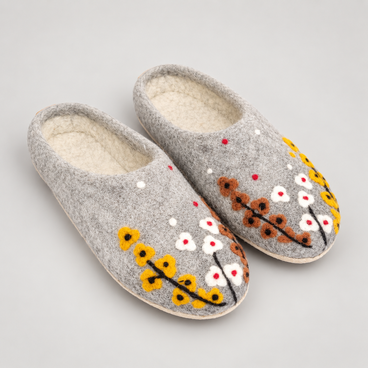 Front view of gray botanical wool slippers
