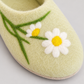 White and yellow felt daisy detail