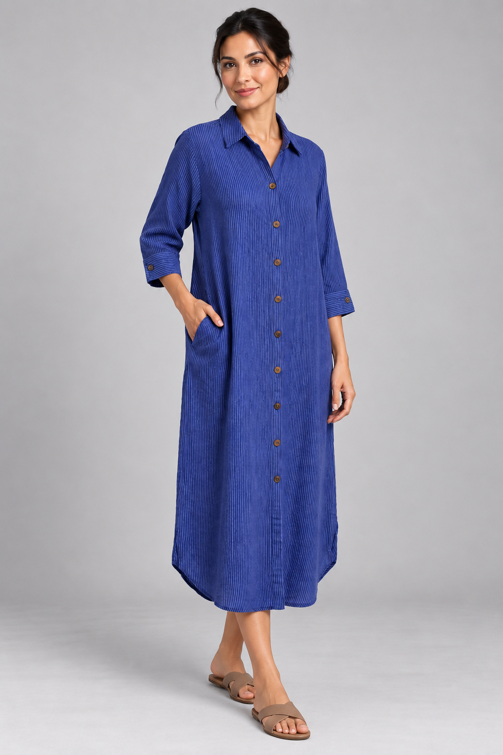 Blue pinstripe long shirt dress, model front angle