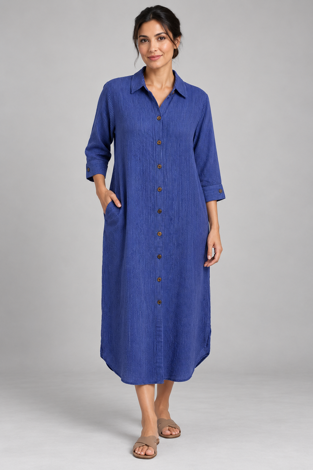 Blue pinstripe long shirt dress, model front
