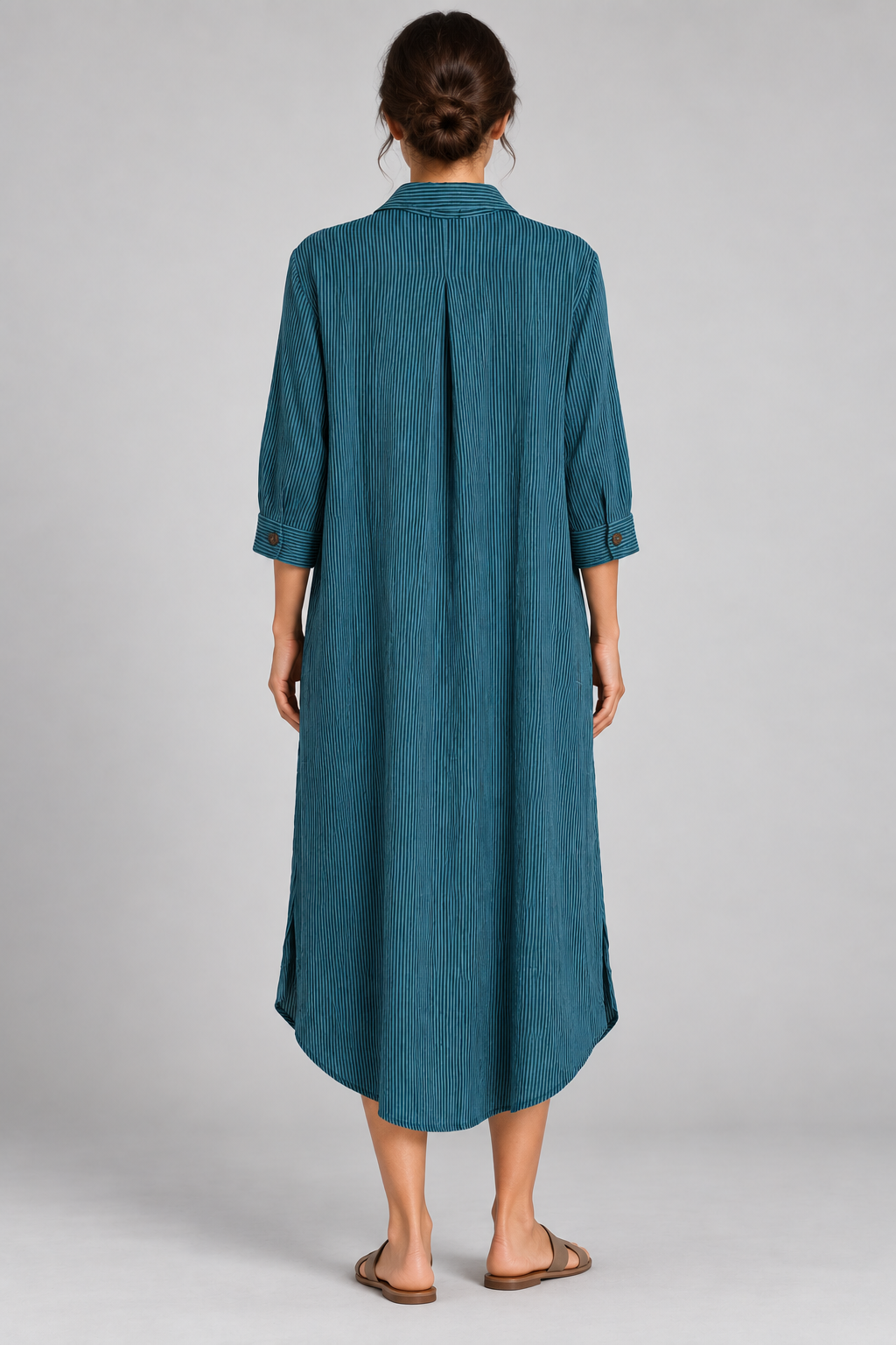 Teal pinstripe long shirt dress on model, back view