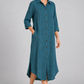 Teal pinstripe long shirt dress on model, front angle view