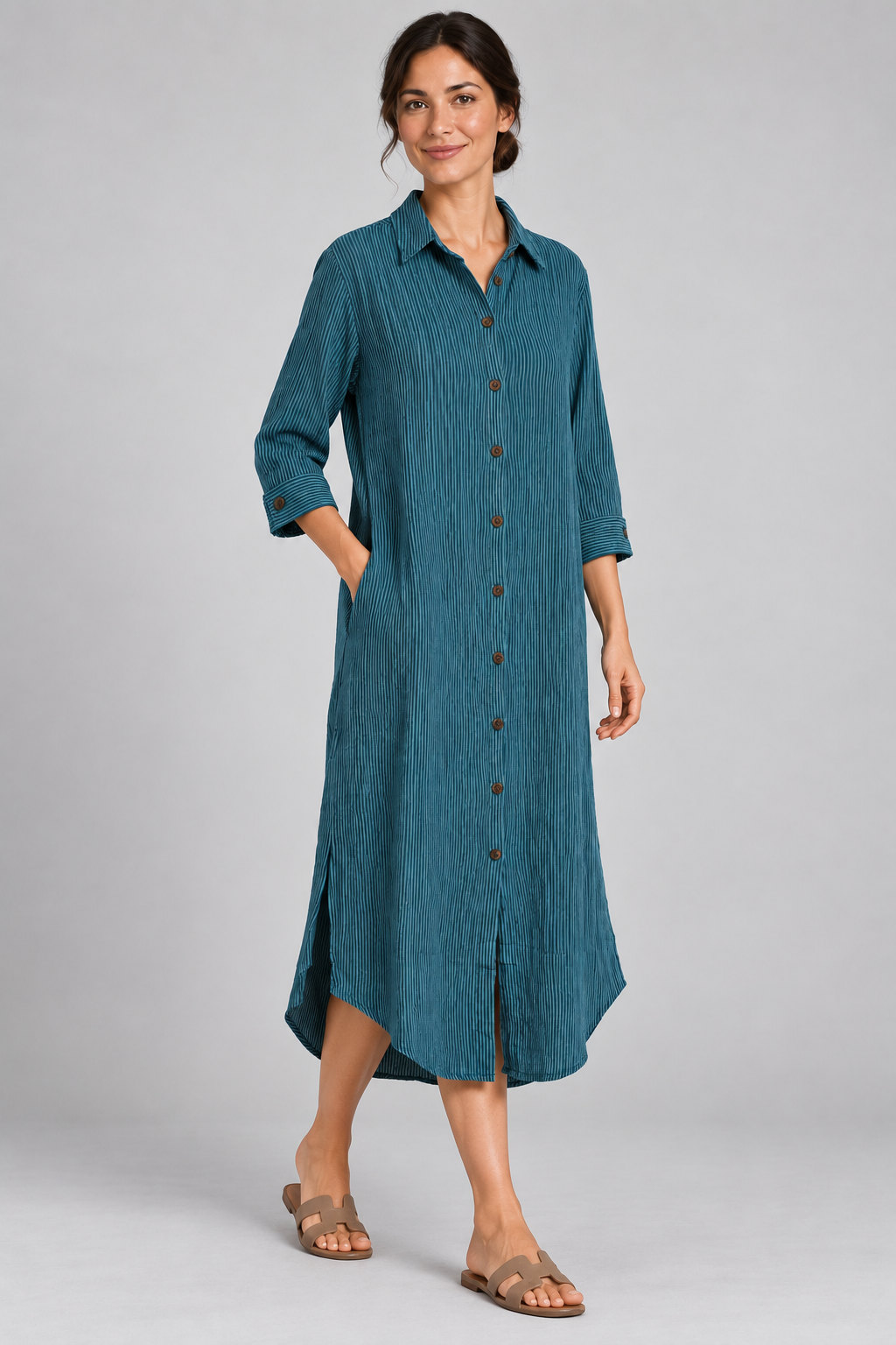 Teal pinstripe long shirt dress on model, front angle view