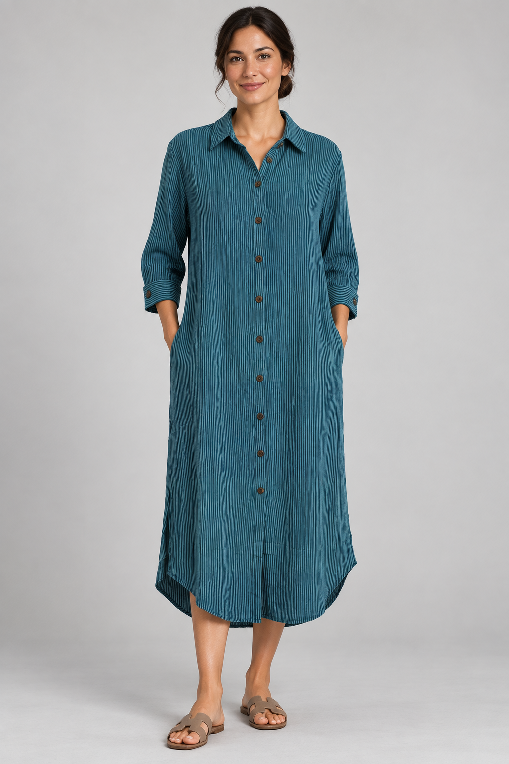 Teal pinstripe long shirt dress on model, front view