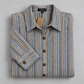 Folded striped dress with label, tag and two-hole brown buttons