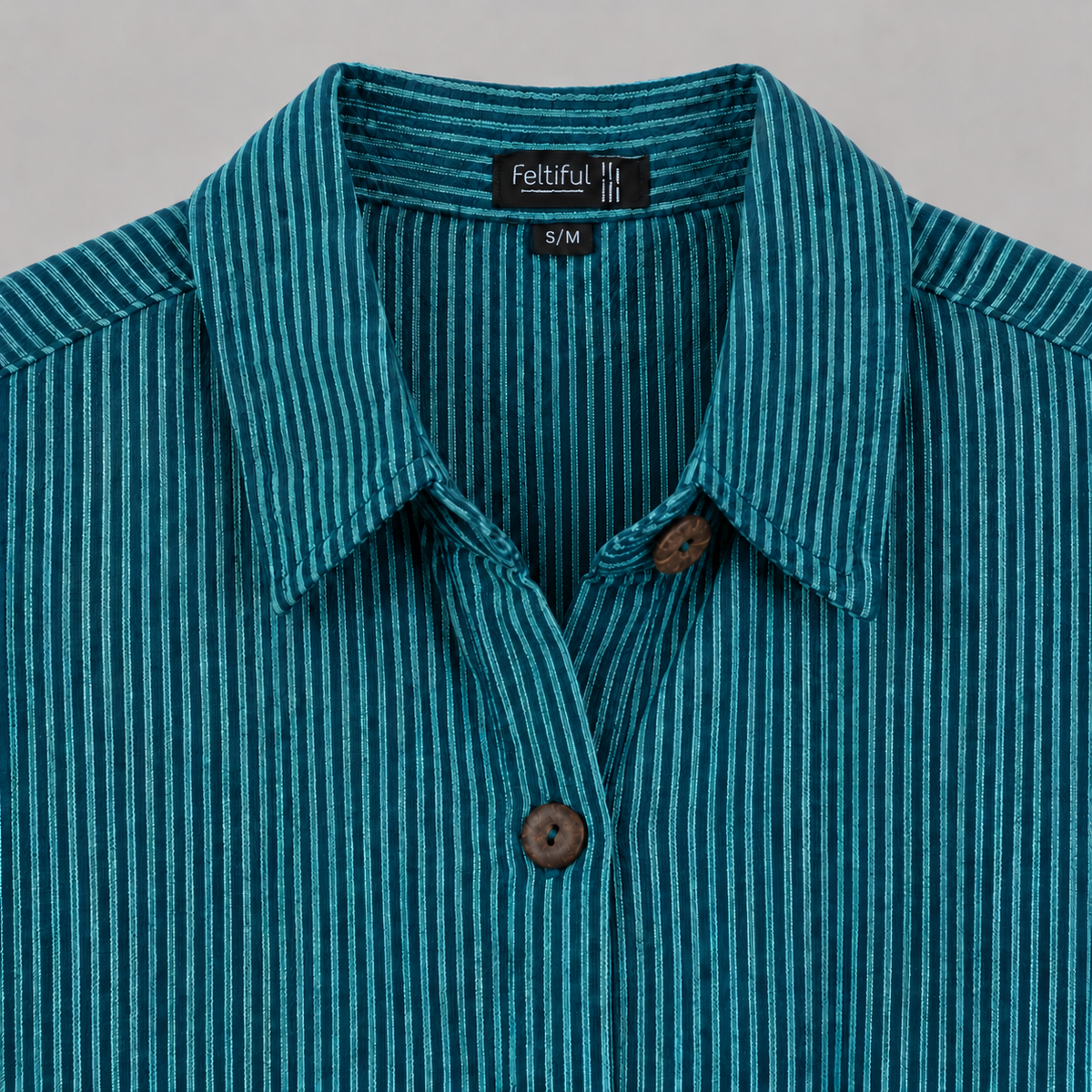 Teal pinstripe cotton tunic collar and two-hole button detail without hangtag