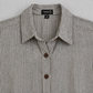 Charcoal pinstripe tunic collar and two-hole buttons