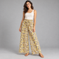 Beige and yellow mushroom print cotton palazzo trousers – AI-generated model styling