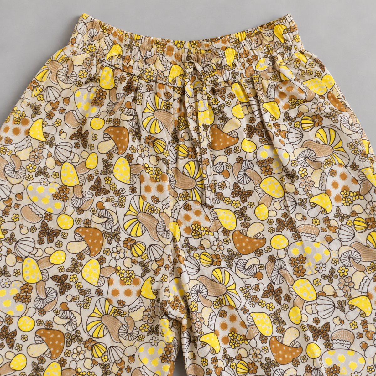 Beige and yellow mushroom print cotton palazzo trousers – Elastic waistband detail