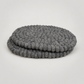 Placemats by Feltiful on a soft warm gray background