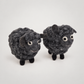 Felted Woolen Sheep-Grey on a soft warm gray background