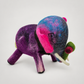 Hand felted Assorted Elephant on a soft warm gray background