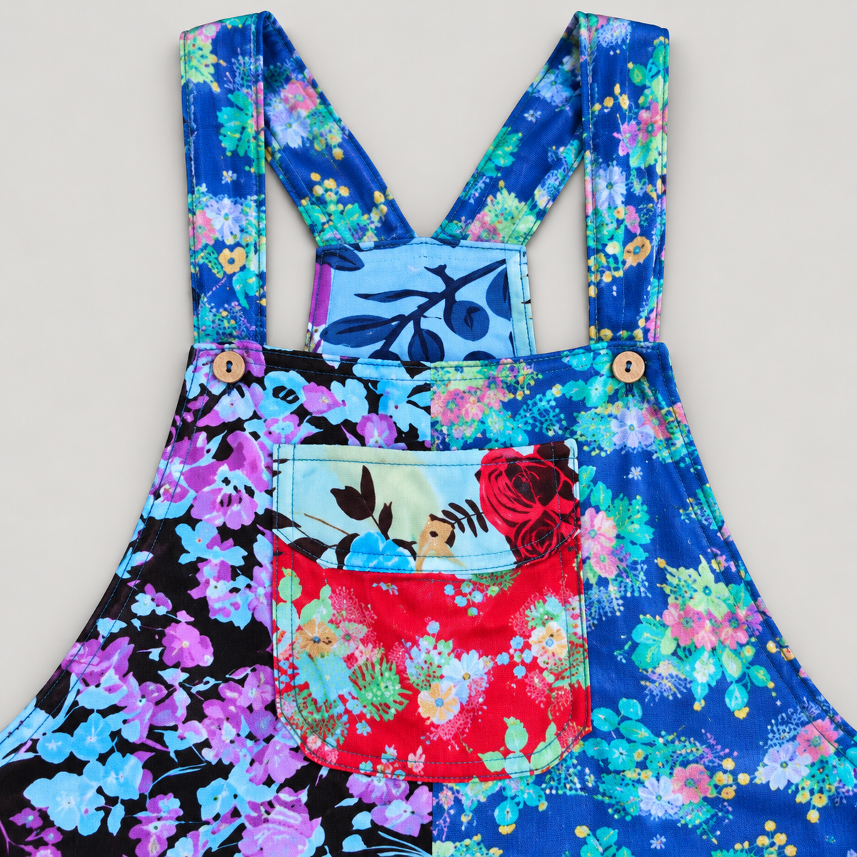KD617 cotton overalls blue floral straps and red floral bib pocket detail