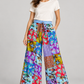 Model wearing KD625 patchwork trousers with one hand in a side pocket