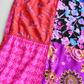 Floral and geometric cotton patchwork seam detail