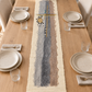 Felt wool table runner centered on a decorated oak dining table