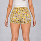 Mushroom Print Cotton Shorts in Beige, back view on model