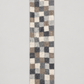 Neutral checker felt wool table runner on warm gray background