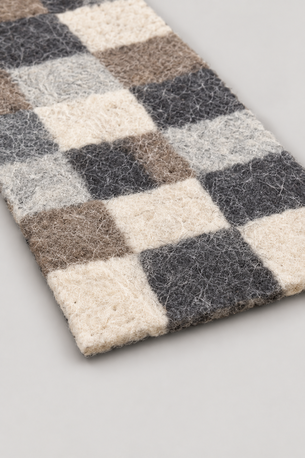 Natural sheep wool fibers and felt edge detail