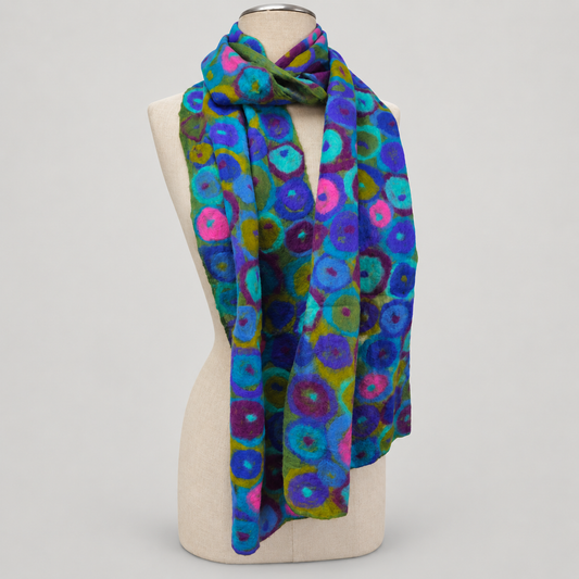 Scarf displayed on a cream mannequin with a soft gray studio background