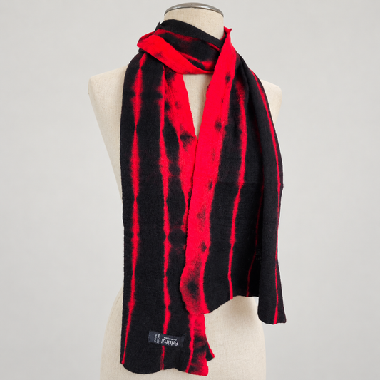 Scarf displayed on a cream mannequin with a soft gray studio background