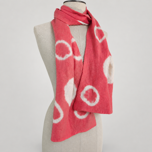 Scarf displayed on a cream mannequin with a soft gray studio background