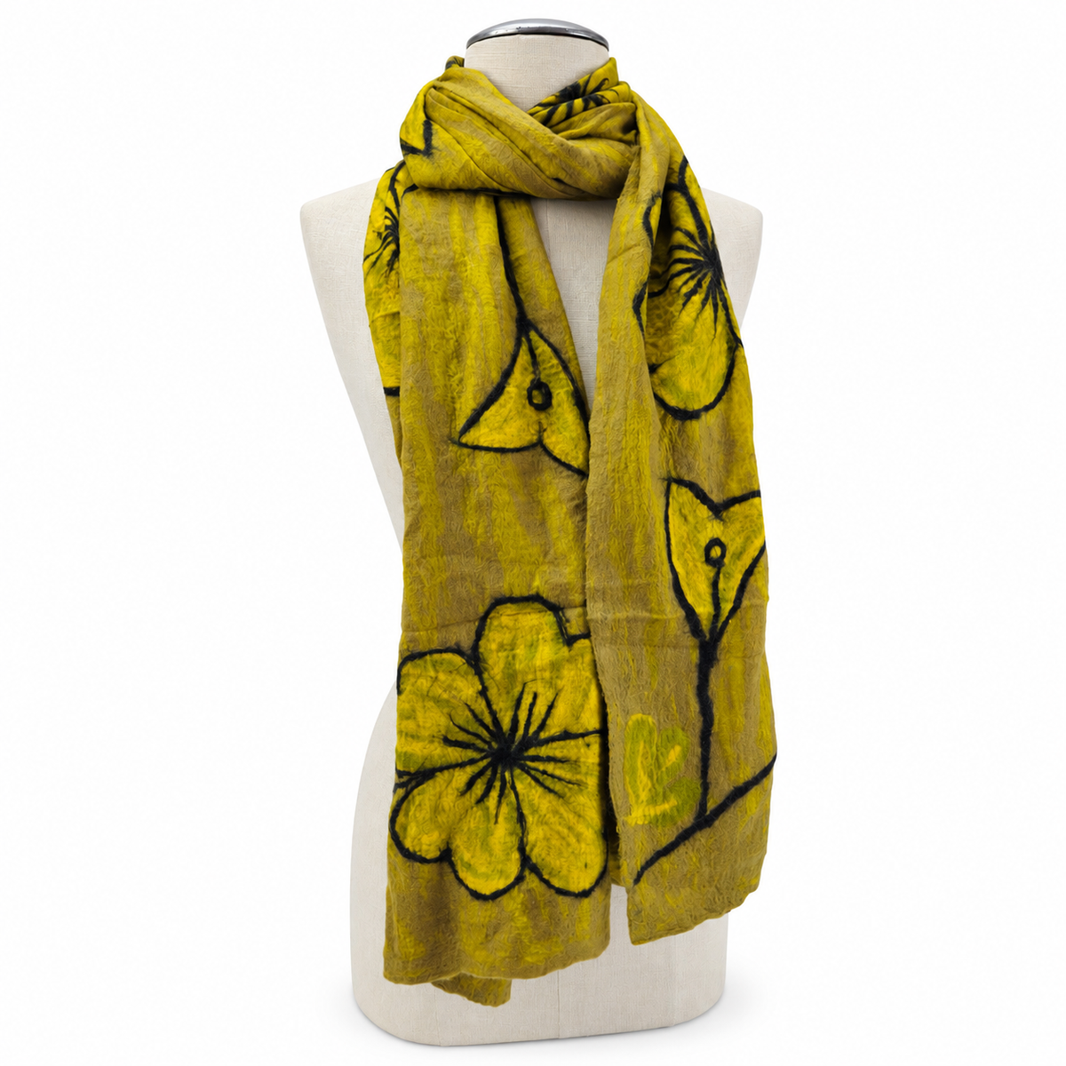 Hand-felted mustard yellow and taupe floral scarf wrapped on a mannequin